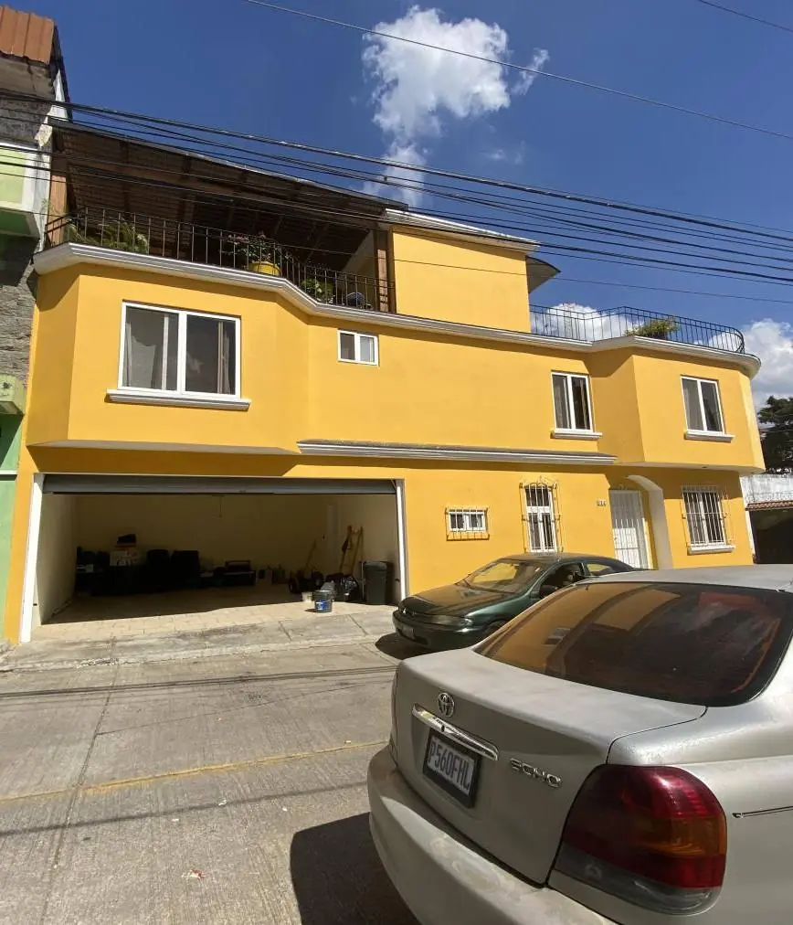 Fachada residencial pintada por Grupo REMO